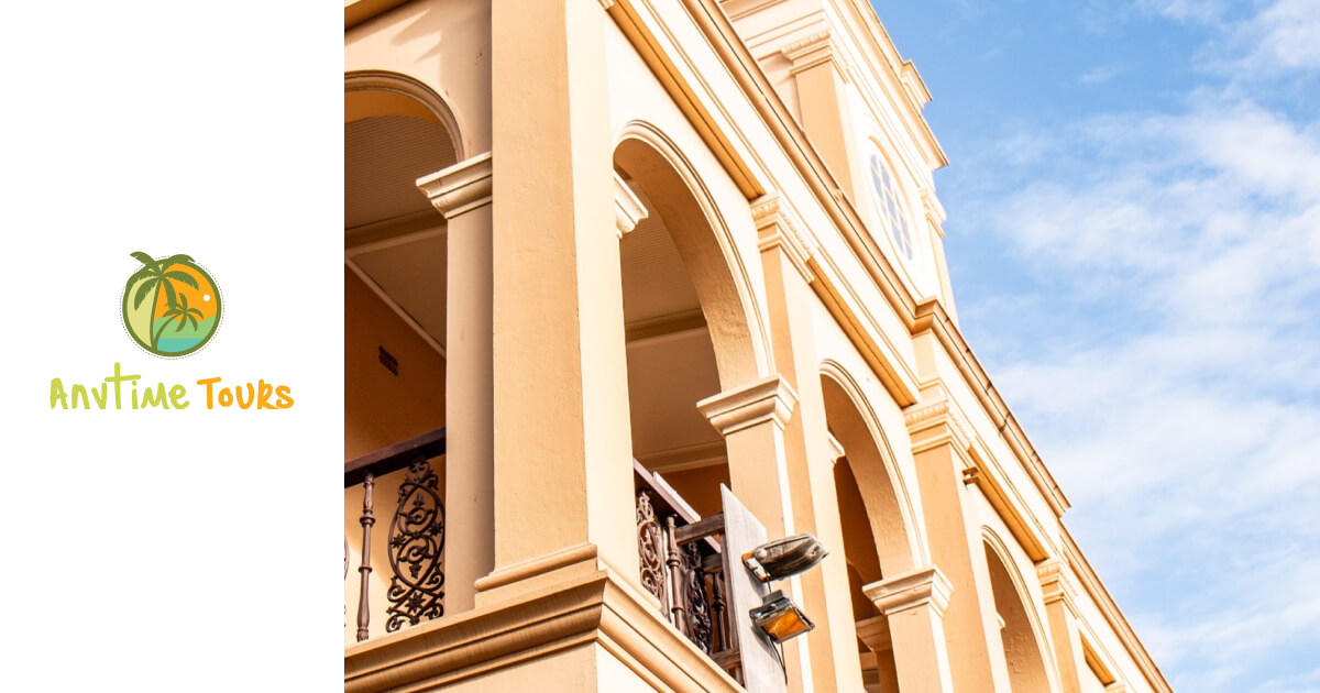 Historic building with arched windows and decorative railings, highlighting the charm explored in Anytime Tours Mackay’s Local Walking Tours.